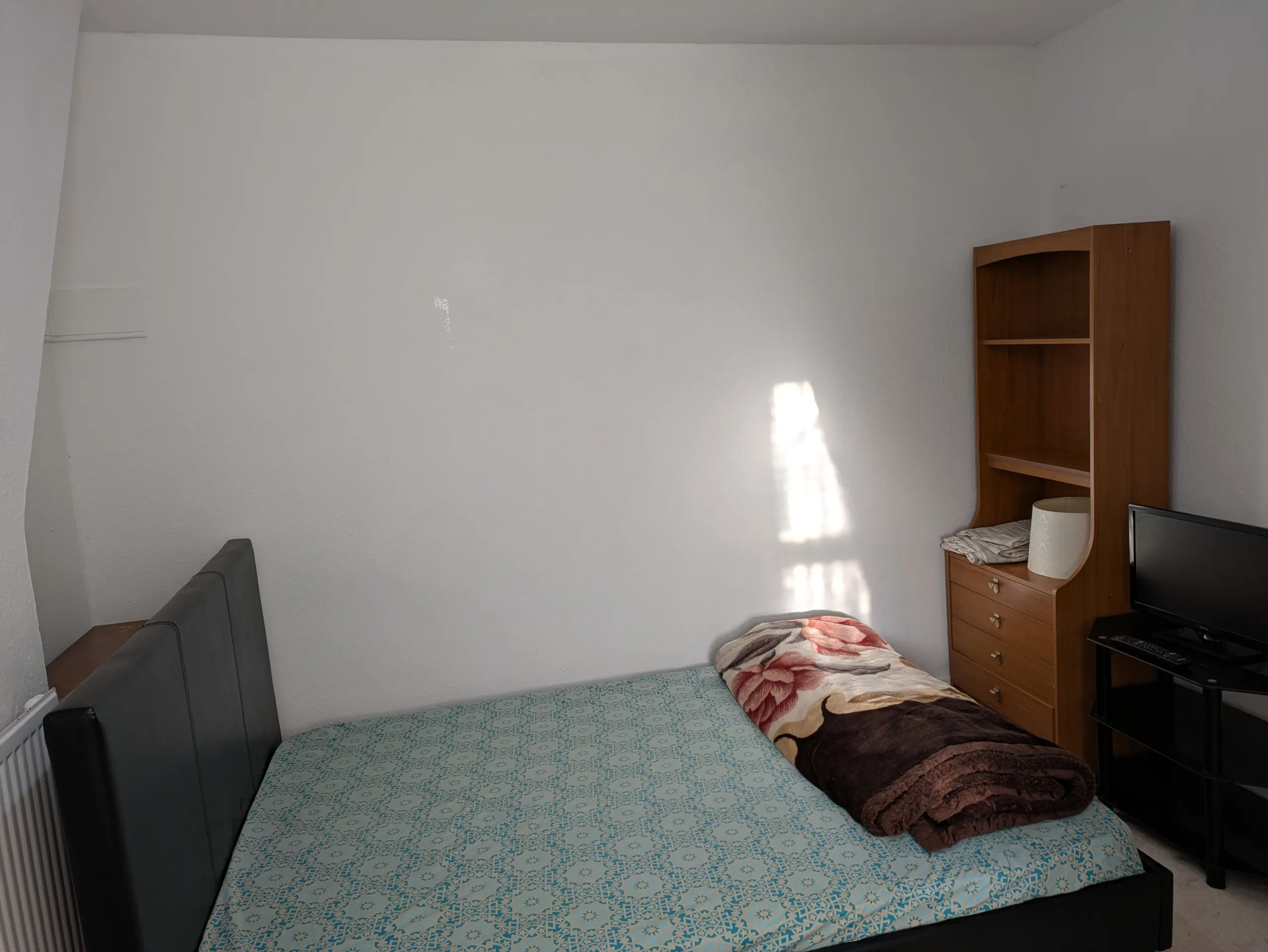 1768673307600-Bedroom 3.jpg